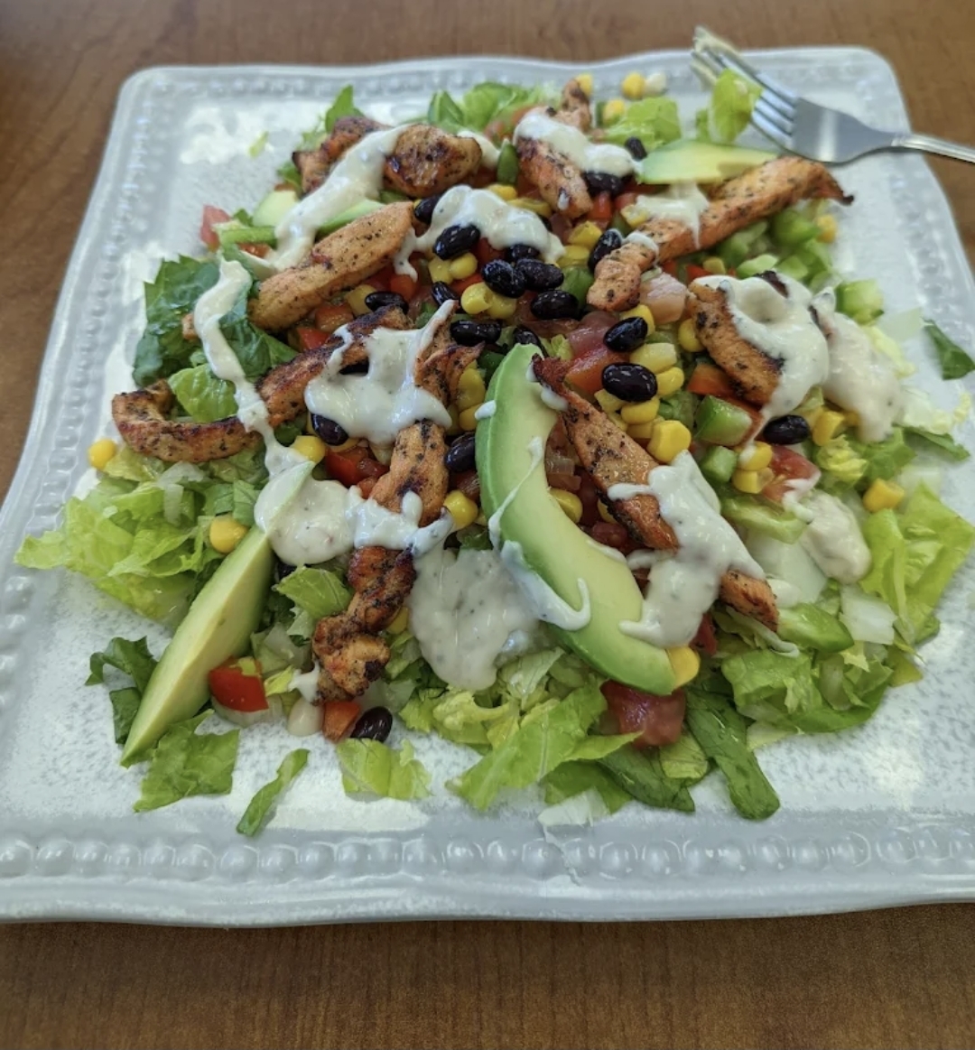 Grilled chicken salad with black beans, corn, avocado and ranch