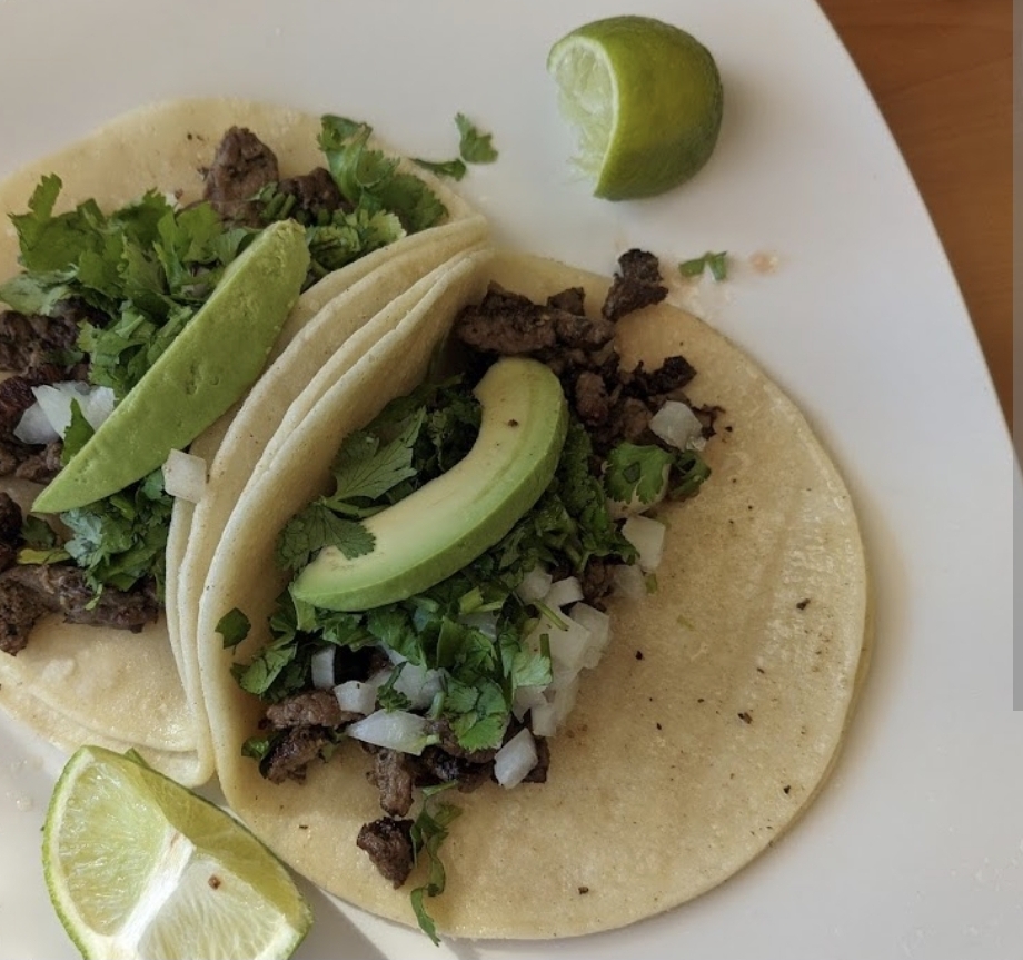 Carne asada steak tacos with onion and cilantro
